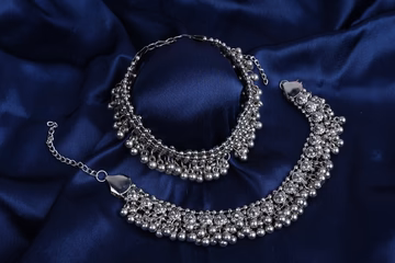 Echoing Rhythms Silver Anklets